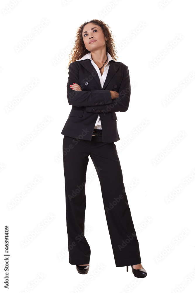 Business woman standing, looking up. Business woman standing, looking up.