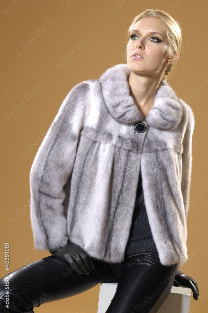 fashion model in autumn/winter clothes posing fashion model in autumn/winter clothes posing