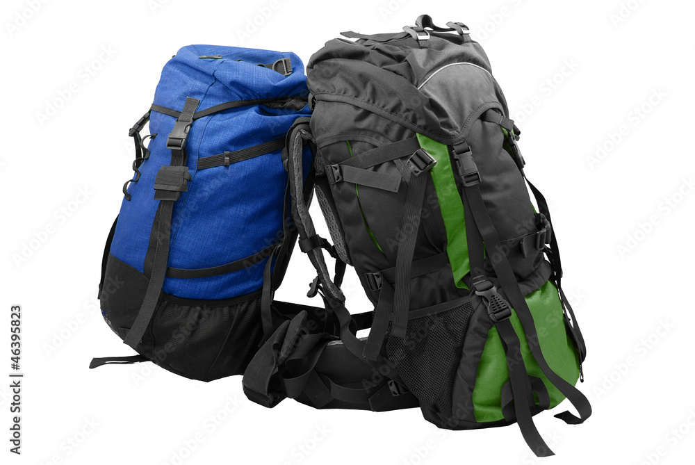 Two used tourist backpacks isolated on white Two used tourist backpacks isolated on white