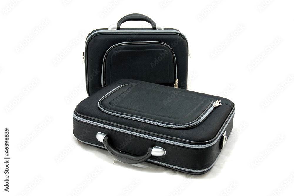 Two black suitcases - vacation baggage - isolated Two black suitcases - vacation baggage - isolated