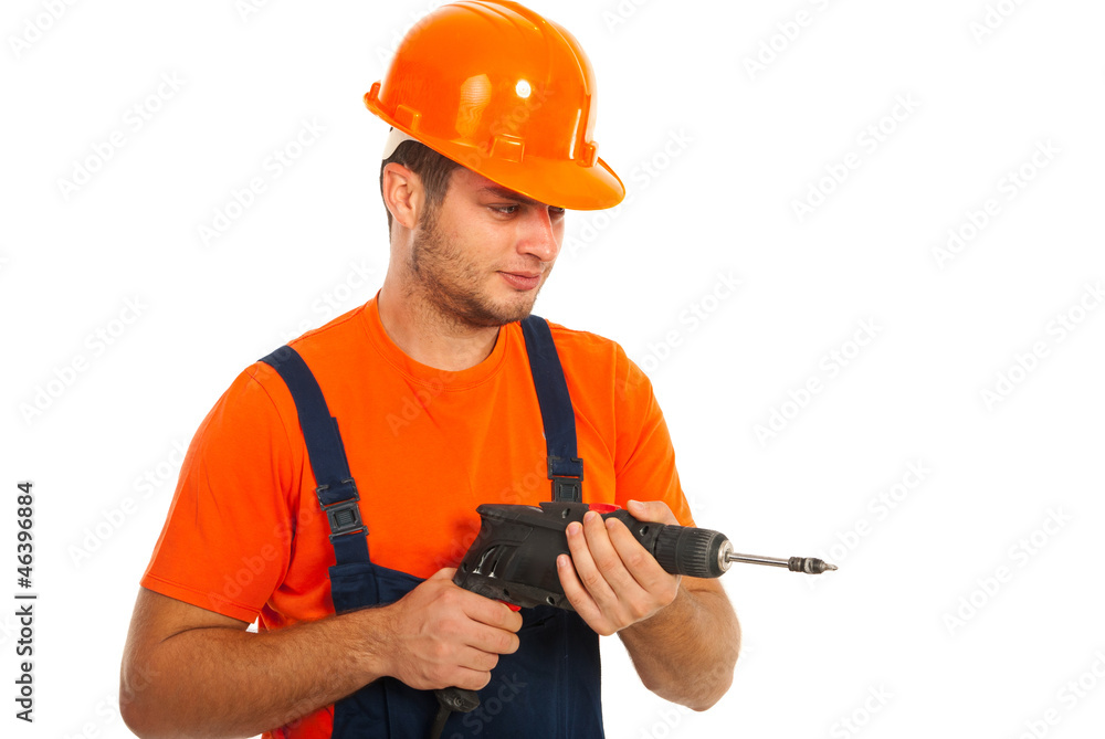 Worker man with a drill