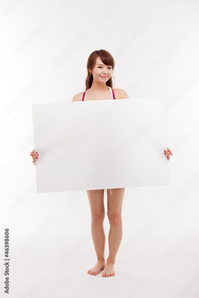 Pretty asian woman holding a penel isolated on white background. Pretty asian woman holding a penel isolated on white background.