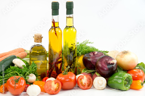 Fototapeta Naklejka Na Ścianę i Meble -  Olive oil, tomatoes, garlic, peppers, onion and mushrooms