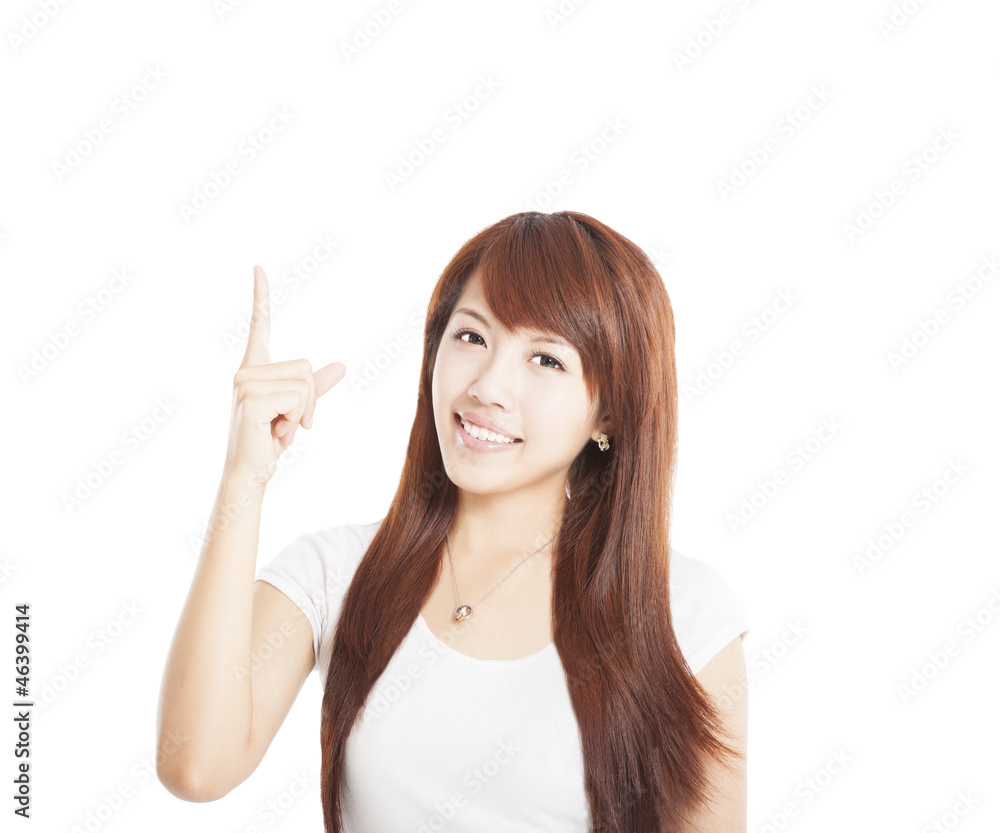 young asian Woman smiling and pointing up young asian Woman smiling and pointing up