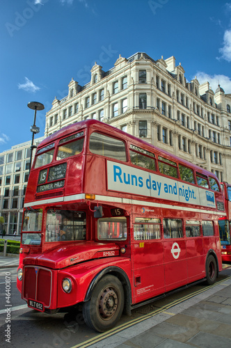 LONDON, SEP 28: Red double decker bus speeds up on the streets o photo