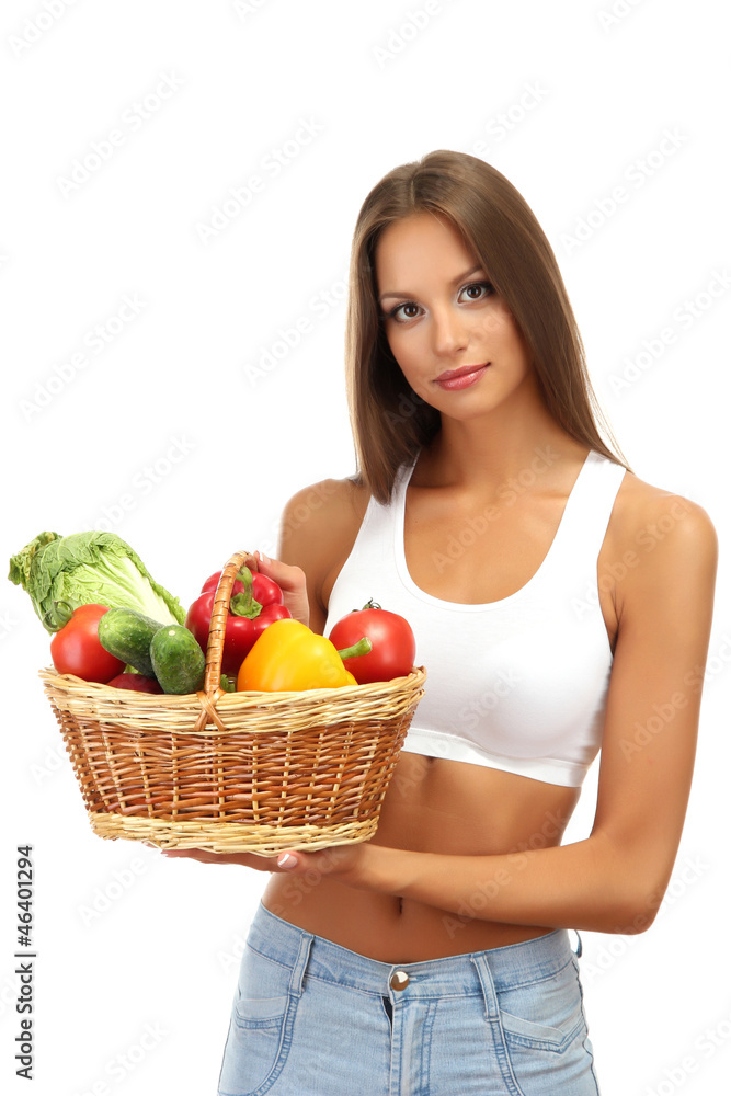 beautiful young woman with vegetables in basket, isolated beautiful young woman with vegetables in basket, isolated