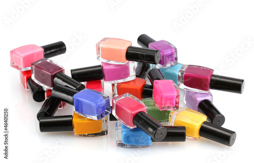 Group of bright nail polishes isolated on white