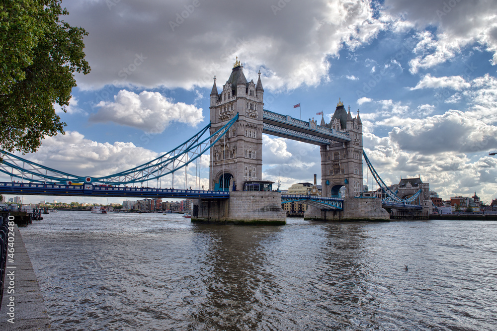 Side view of Tower Bridge with river Thames, London