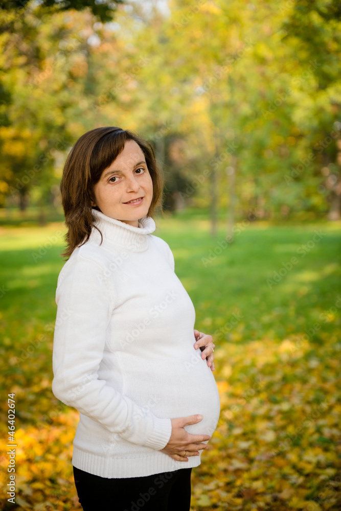 Expecting - pregnant woman outdoor Expecting - pregnant woman outdoor