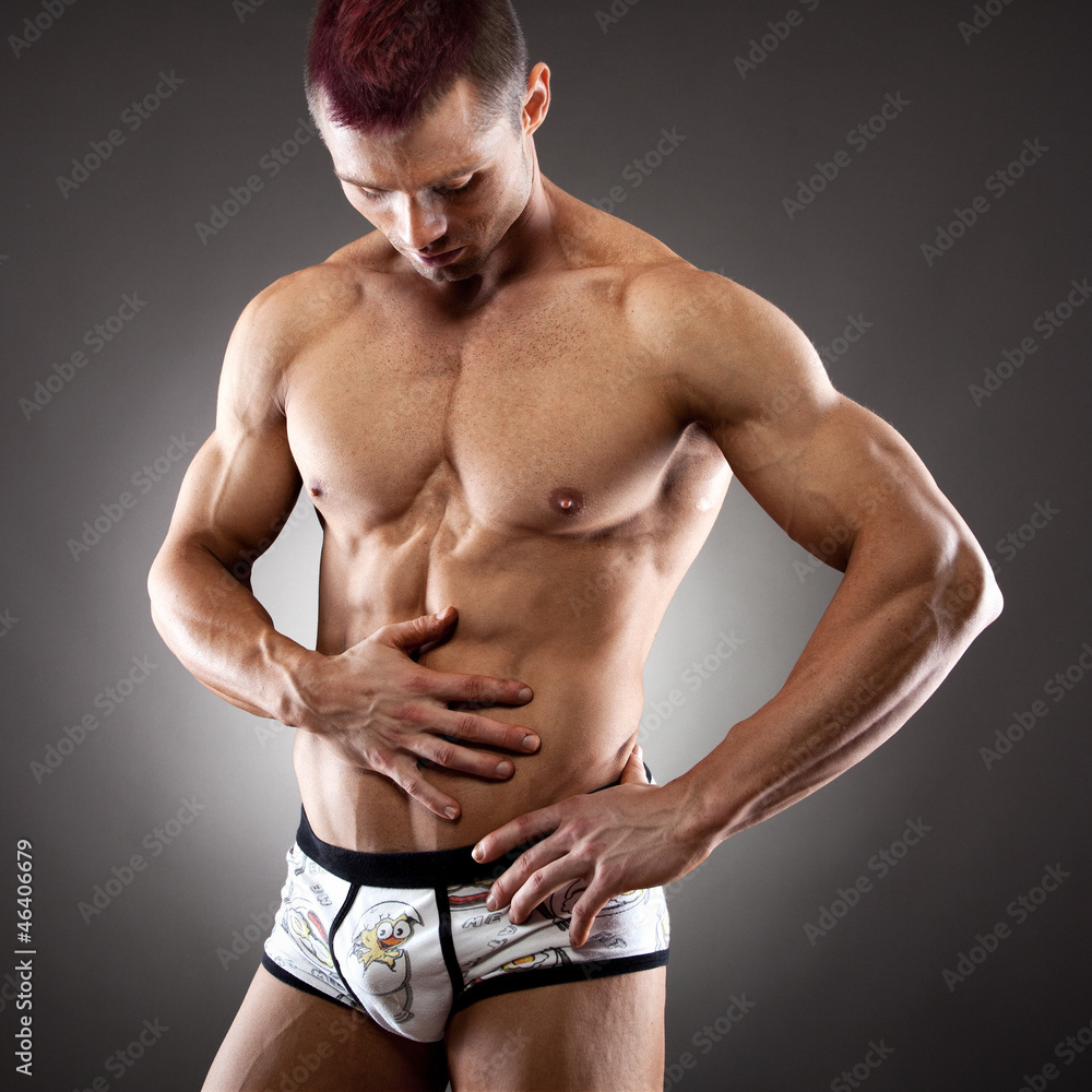 Fototapeta premium Fit and muscular young man