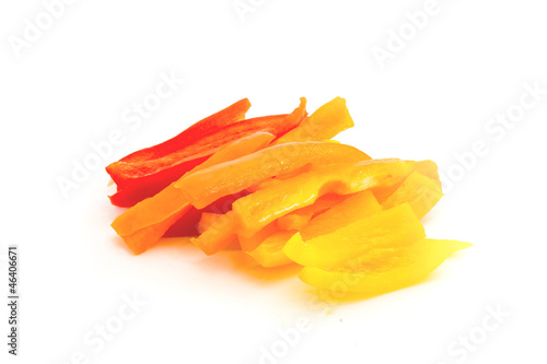 Sliced peaces of red, orange and yellow pepprer