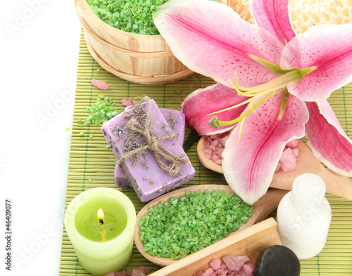 Fototapeta Naklejka Na Ścianę i Meble -  beautiful spa setting with lily isolated on white
