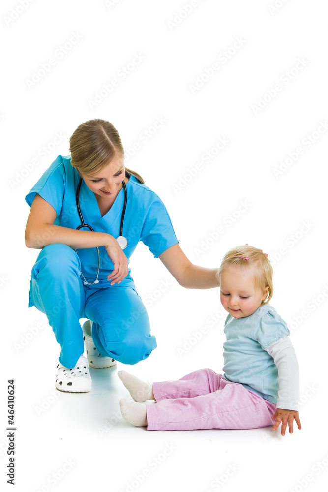 Doctor with toddler child isolated on white Doctor with toddler child isolated on white