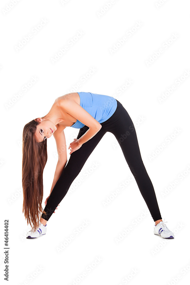 woman doing her gym exercise bending to the right woman doing her gym exercise bending to the right