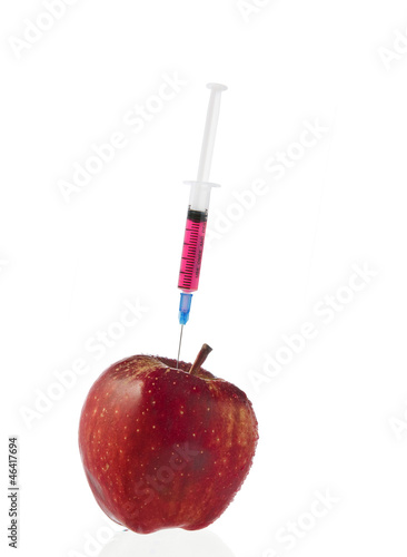 red apple and syringes isolated on white