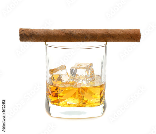 Whiskey  and a cigar isolated on white background