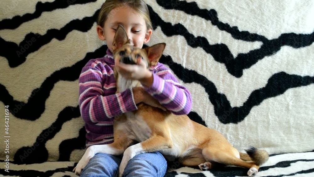 little girl with red puppy