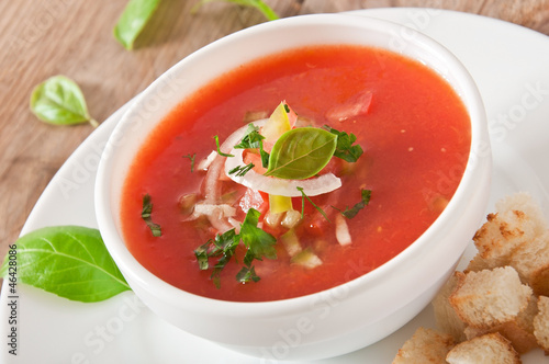 delicious cold Gazpacho soup in white bowl