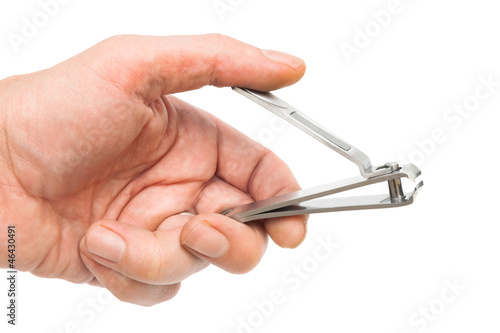 nail clippers in hand