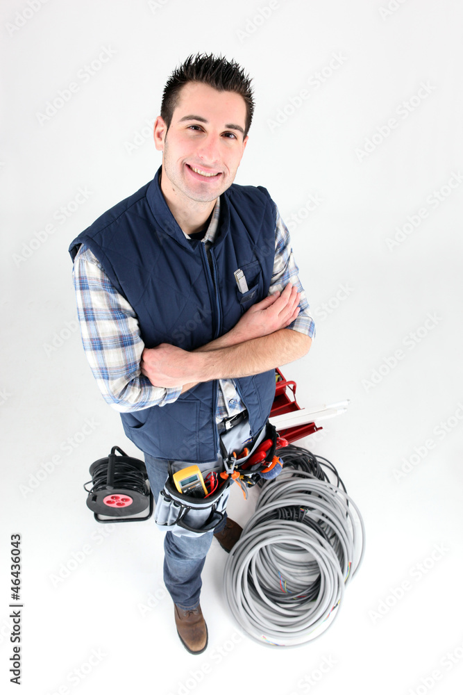 Electrician stood with his arms crossed Electrician stood with his arms crossed