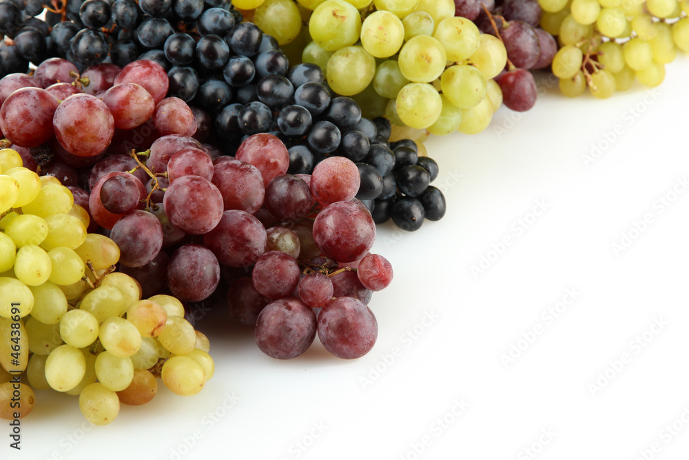 assortment of ripe sweet grapes isolated on white. assortment of ripe sweet grapes isolated on white.