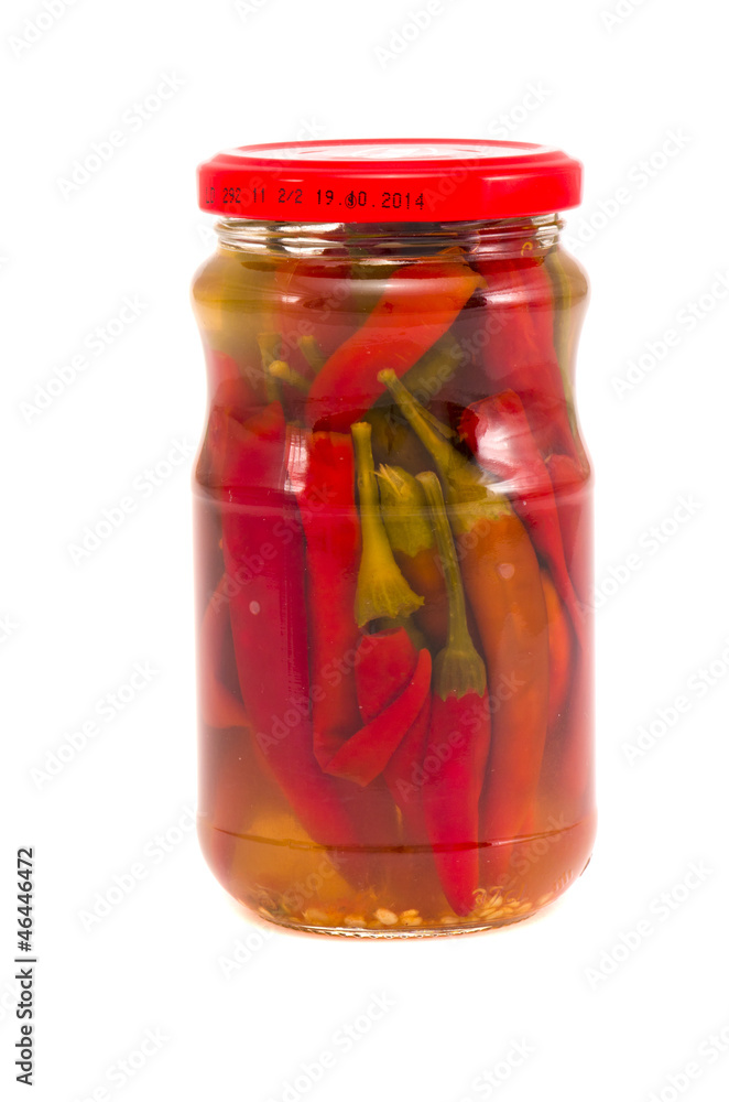 pickled peppers in glass jar isolated on white pickled peppers in glass jar isolated on white