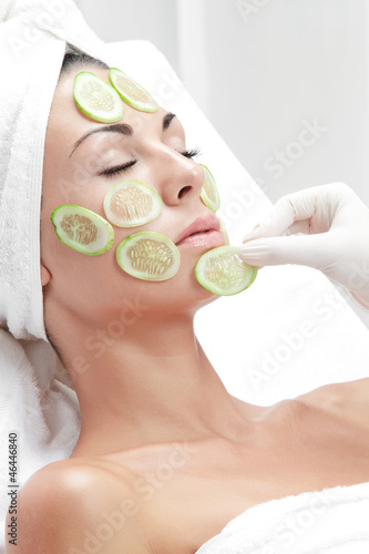 portrait of young beautiful woman being treated