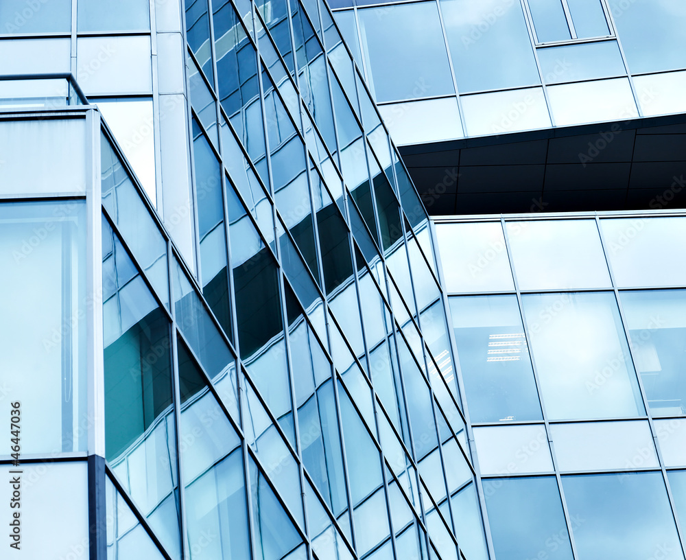 Obraz premium View to steel blue background of glass high rise buildings