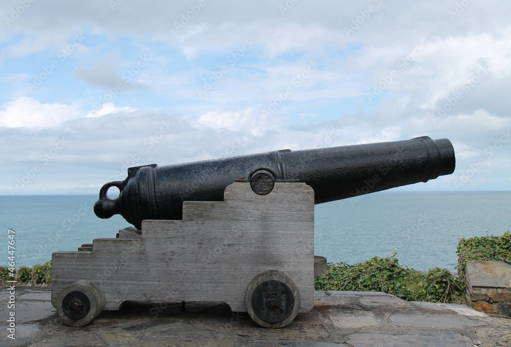 A Vintage Cannon in Position Facing the Open Sea.