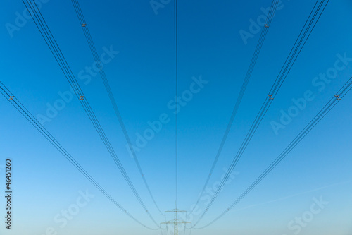High-voltage wires against the sky