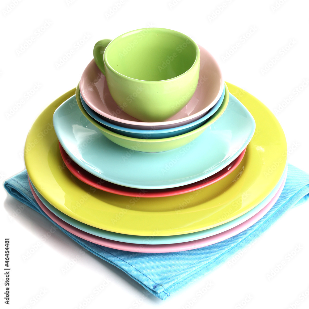 Colorful plates on napkin isolated on white Colorful plates on napkin isolated on white