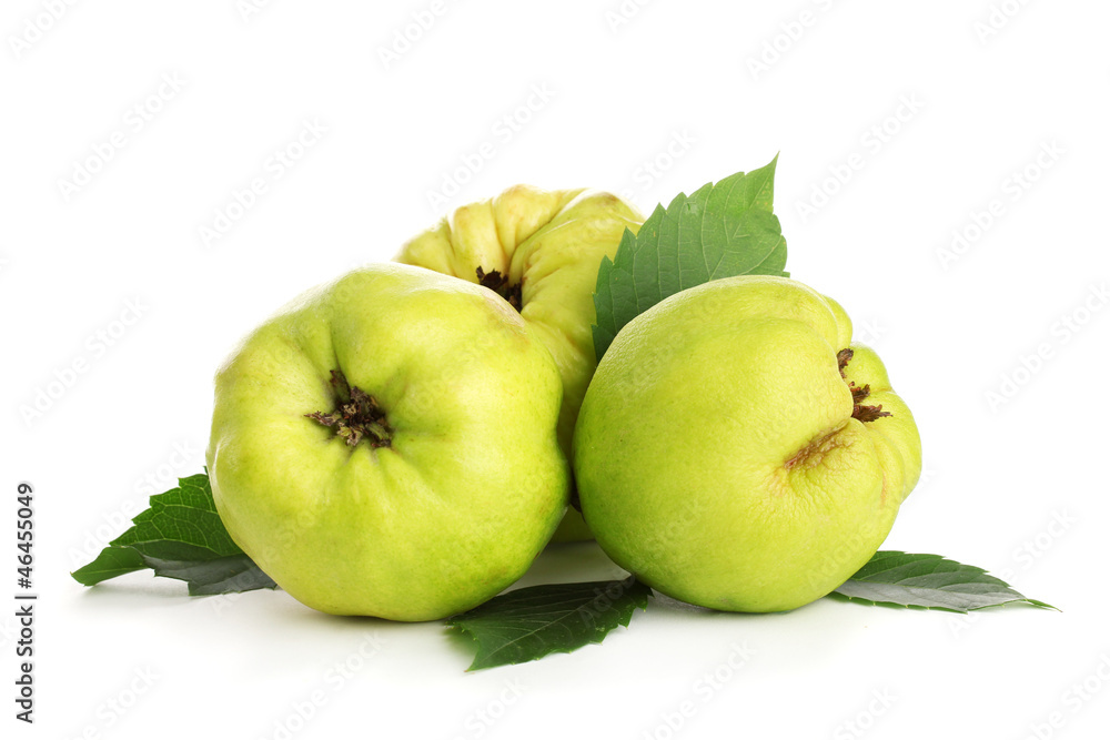 sweet quinces with leaves, isolated on white sweet quinces with leaves, isolated on white