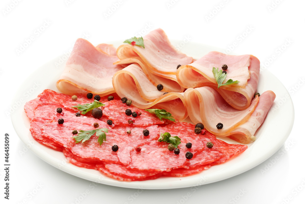 tasty bacon and sausage with spices on plate, isolated on white tasty bacon and sausage with spices on plate, isolated on white