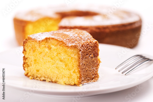 Photo piece of cake with icing sugar