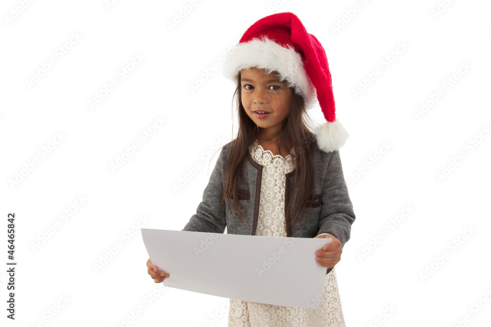 enfant avec panneau publicitaire et bonnet de noel enfant avec panneau publicitaire et bonnet de noel