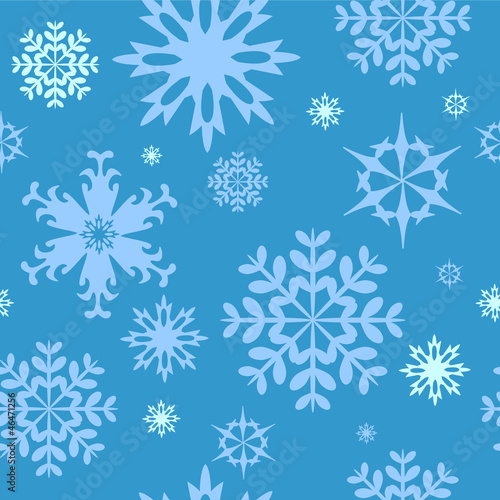 Seamless winter background with snowflakes
