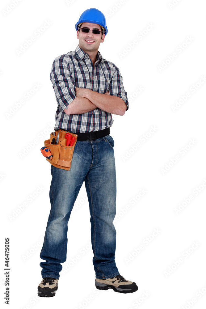 Cocky laborer posing on white background Cocky laborer posing on white background