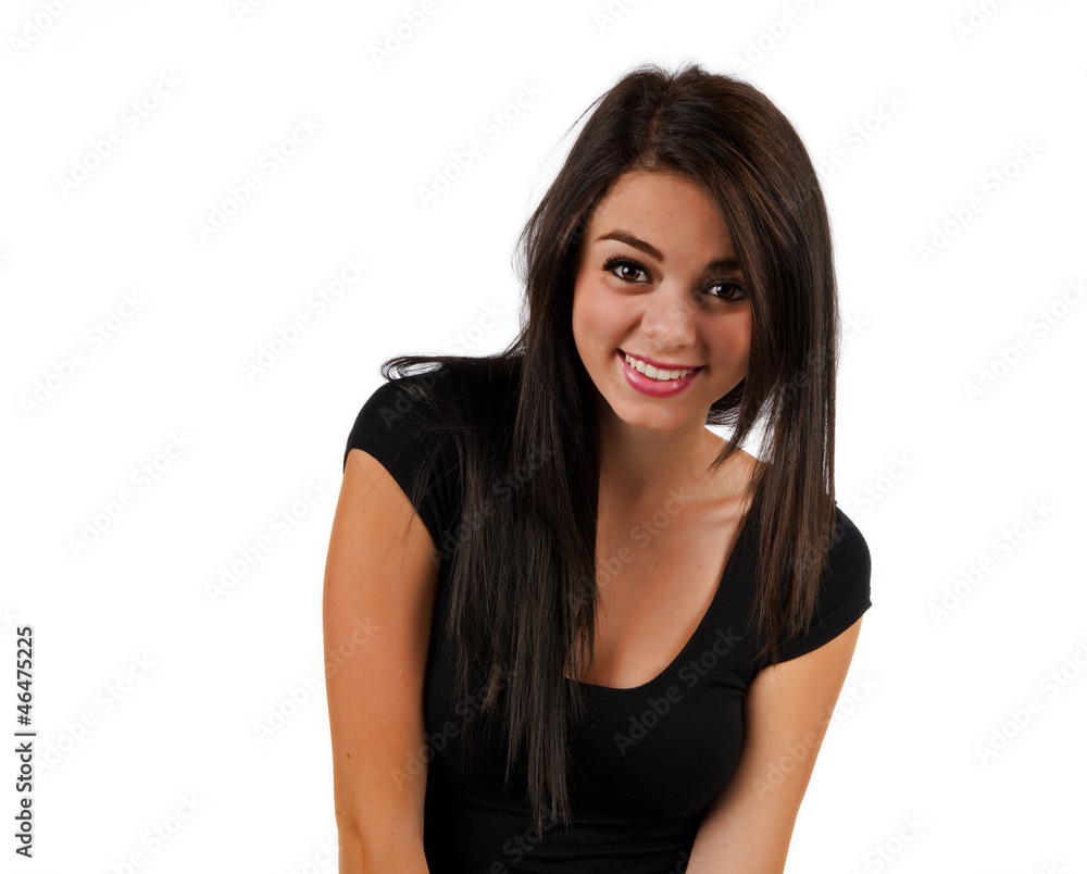 Teen girl isolated on white smiling at the camera Teen girl isolated on white smiling at the camera