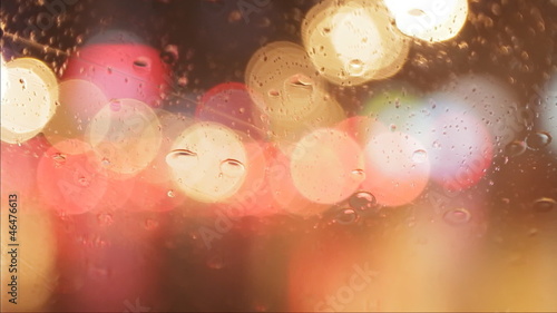 car window rain night background defocused in motion