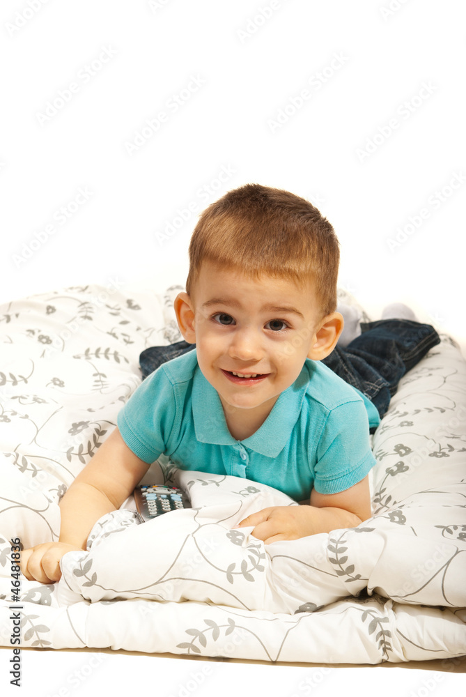 Smiling boy lying on blanket Smiling boy lying on blanket