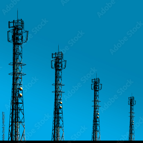 Shadow telecomunication tower on blue background photo