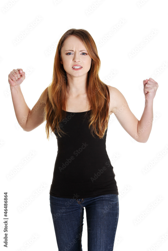 Frustrated and angry woman with fists up Frustrated and angry woman with fists up