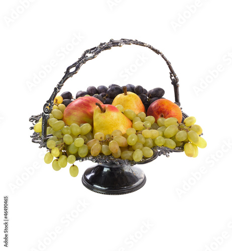 Antique vase with fruits. Isolated.