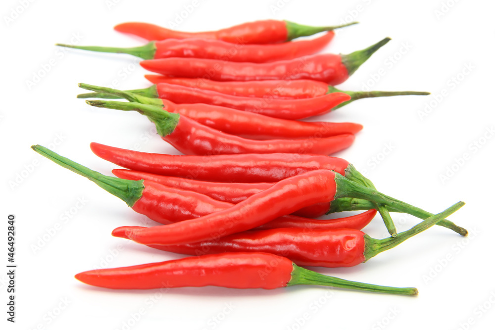 Bird’s eye chilis isolated on white Bird’s eye chilis isolated on white