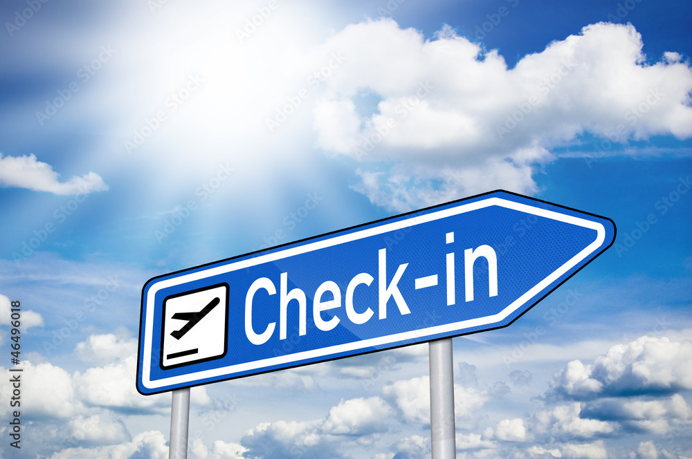 Wegweiser in Blau mit Sonne und Check-in Wegweiser in Blau mit Sonne und Check-in