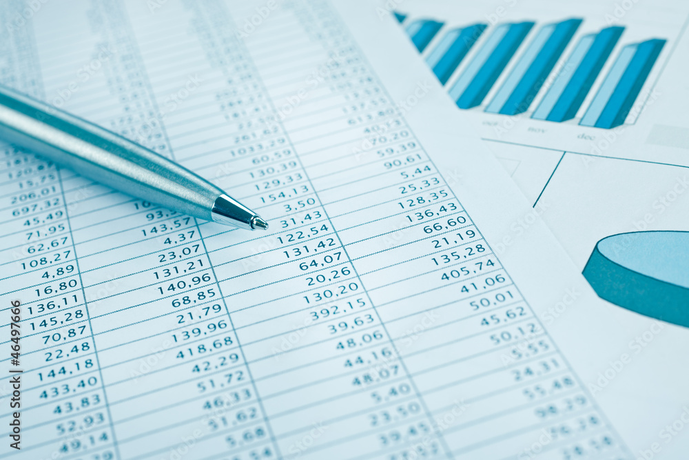 Business data report print and pen close up. Blue toned. Business data report print and pen close up. Blue toned.