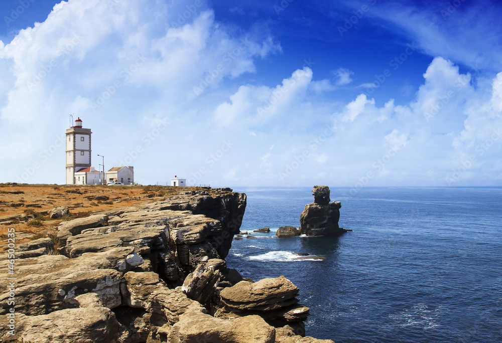 portuguese lighthouse over blue ocean
