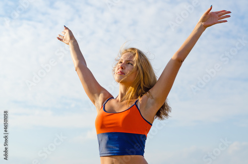 Woman rejoicing in the sunshine