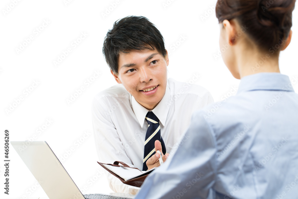Young asian smiling businesswoman and businessman Young asian smiling businesswoman and businessman