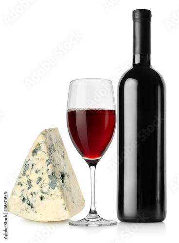 Wine bottle, wineglass and cheese